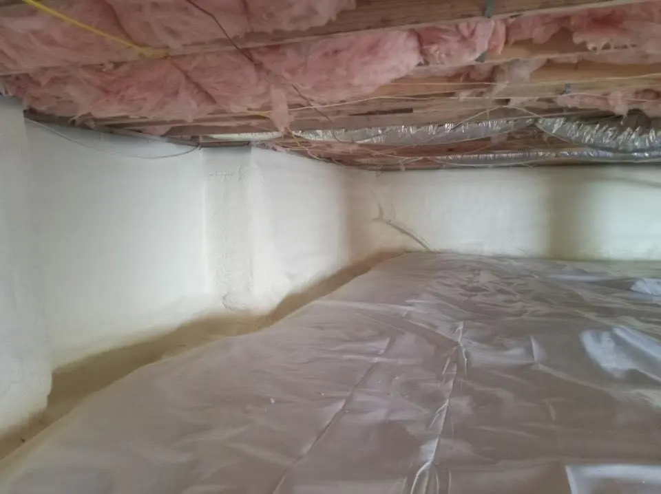Crawl space encapsulation with closed-cell spray foam for Commercial Roof Restoration in Swainsboro